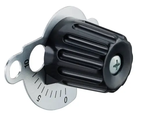 Oventrop Einstellgruppe mit schwarzem verstellbarem Knopf und Skala zur manuellen Anpassung. Gehäuse aus Metall mit Markierungen für die Einstellwerte.